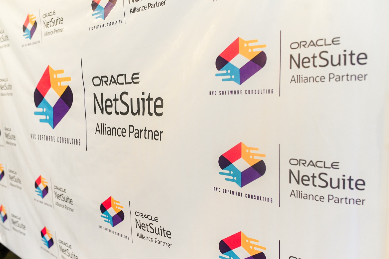 Close-up of the AVC Software Consulting and Oracle NetSuite Alliance Partner media wall