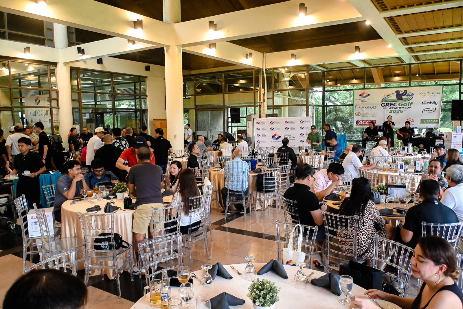 Guests mingling at the GREC Golf All Weather Cup 2026 reception