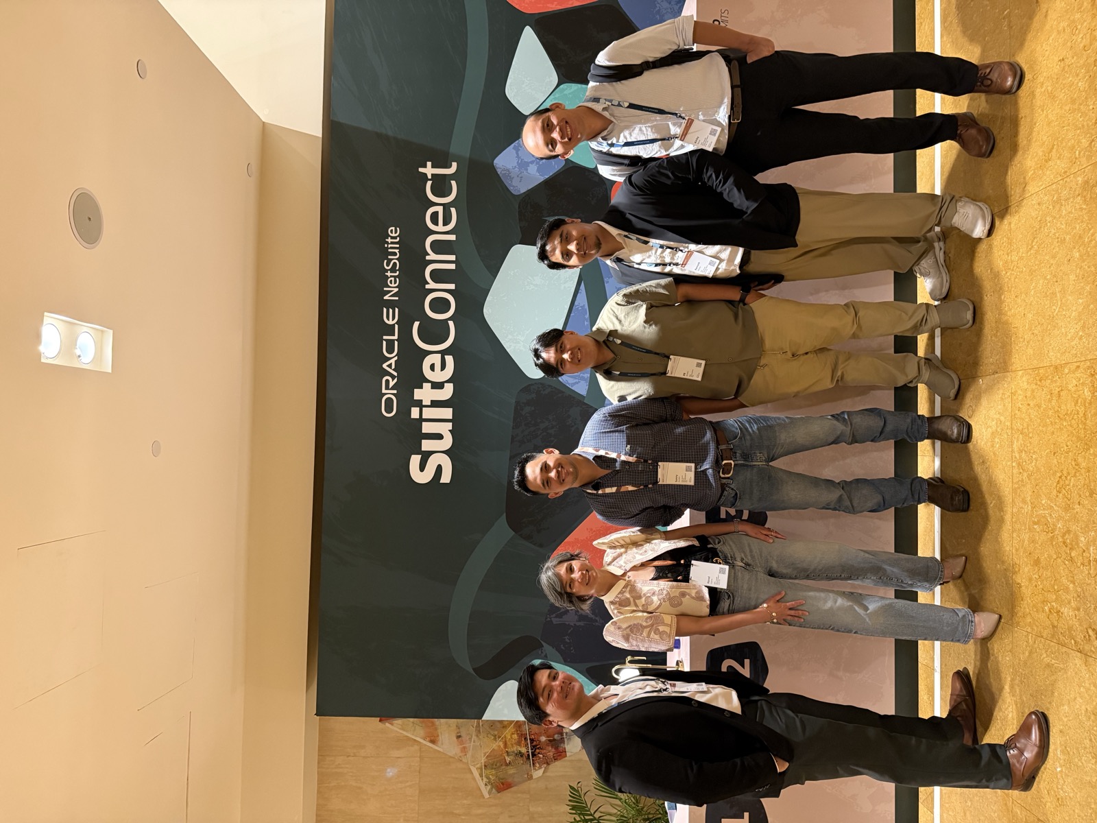AVC team at the SuiteConnect backdrop